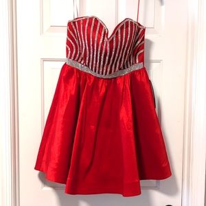 Red cocktail/prom dress with beautiful diamond detail on the front